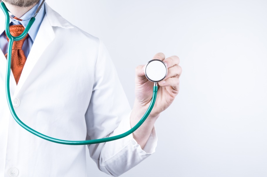 specialist using a stethoscope