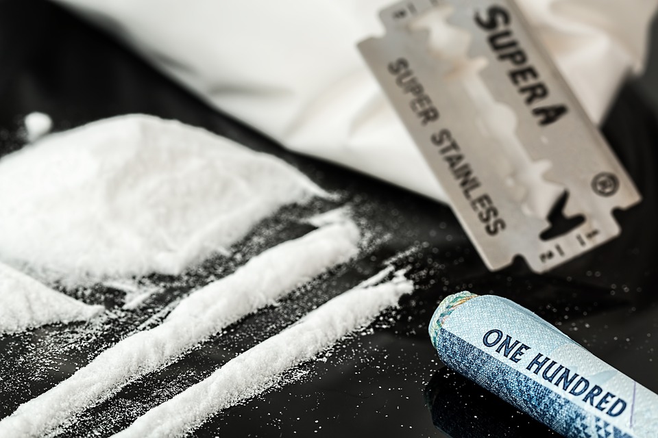 illegal drugs, blade and money bill